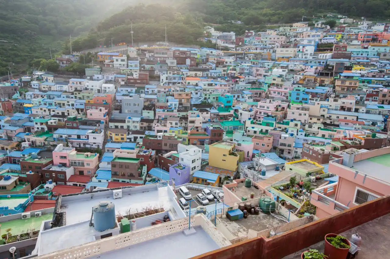 Pastel-roofed houses packed in terraces up the hillside of Gamcheon Culture Village
