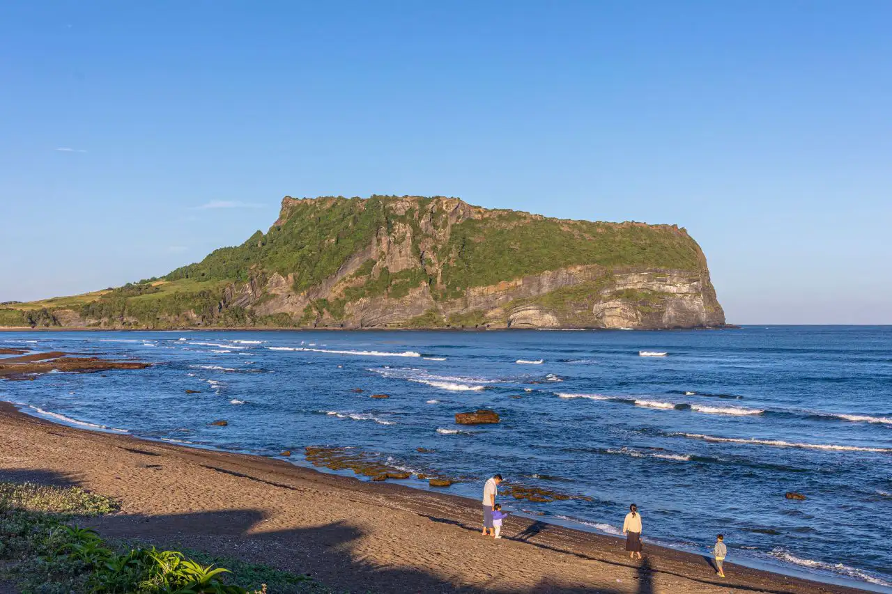 Seongsan Ilchulbong across the waves from Gwangchigi Beach