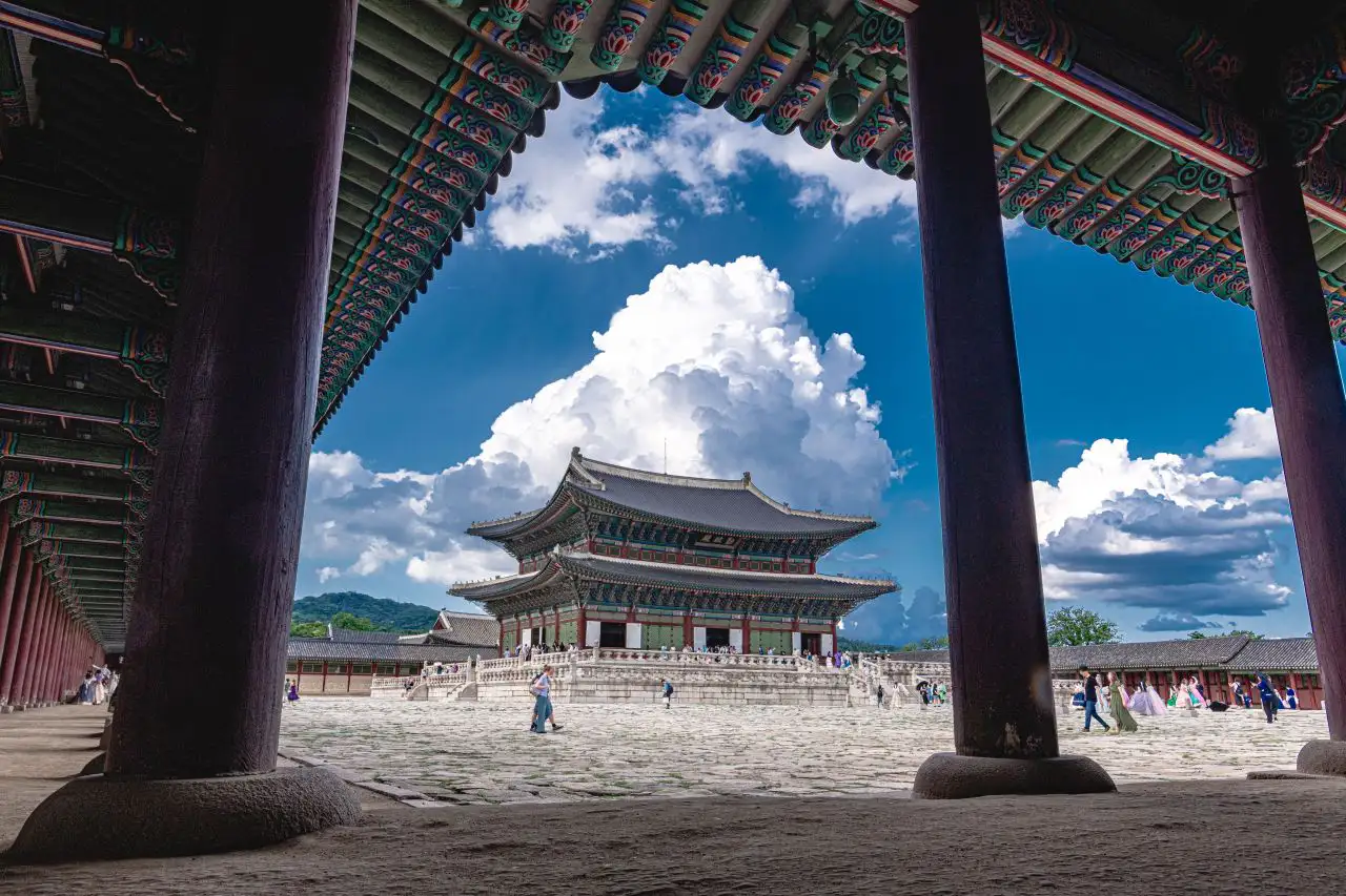 Geunjeongjeon throne hall framed by the red pillars of the cloister