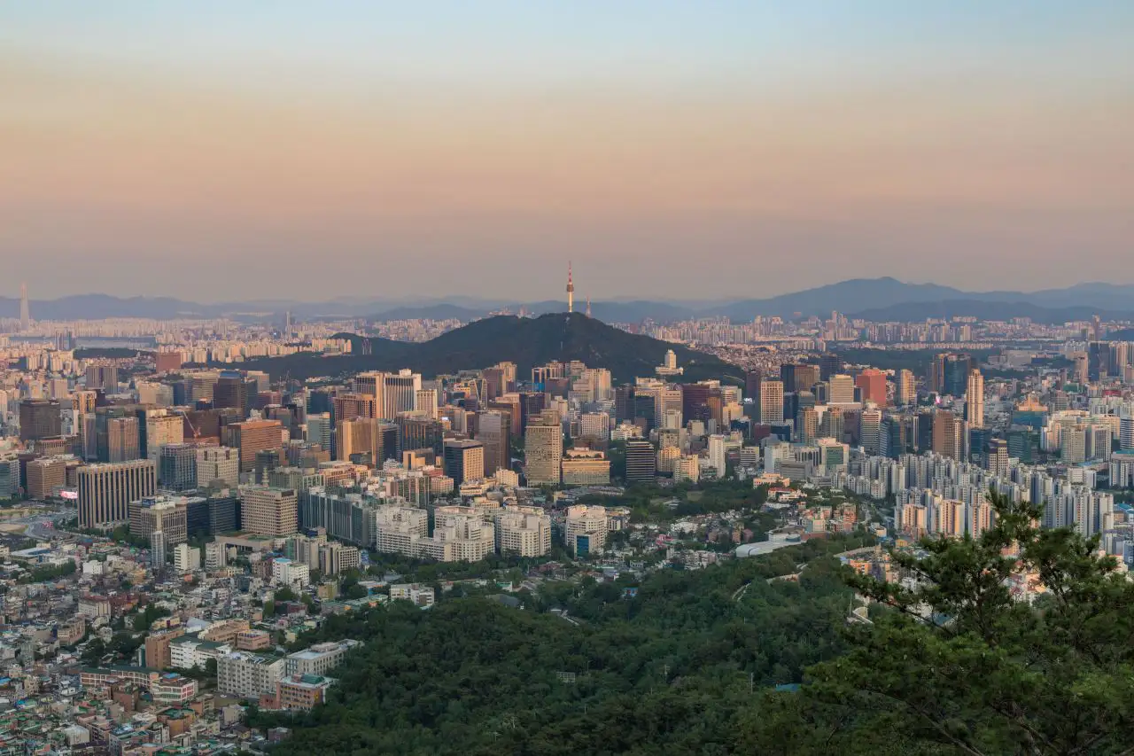 N Seoul Tower on Namsan above the dense city, seen from Inwangsan